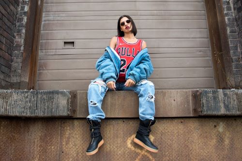 How to Style an NBA Jersey. Person Sitting On A Wall.